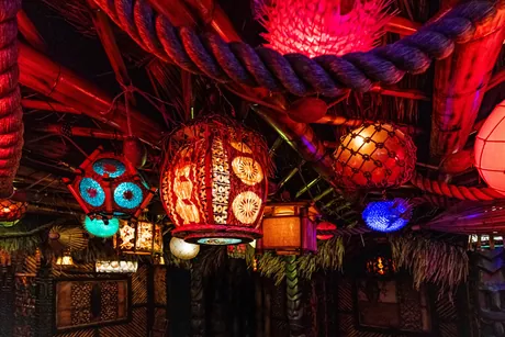 Inside House of Bamboo — lantern-lit ceiling