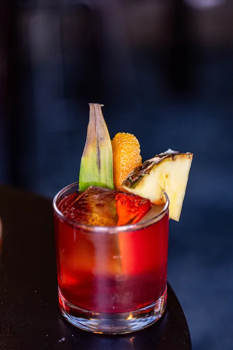 A red tiki cocktail