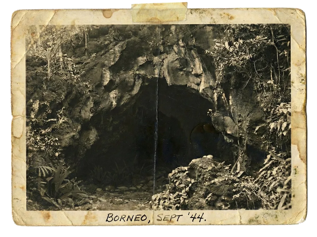 A recovered 1944 photograph of a jungle cave — the entrance to House of Bamboo